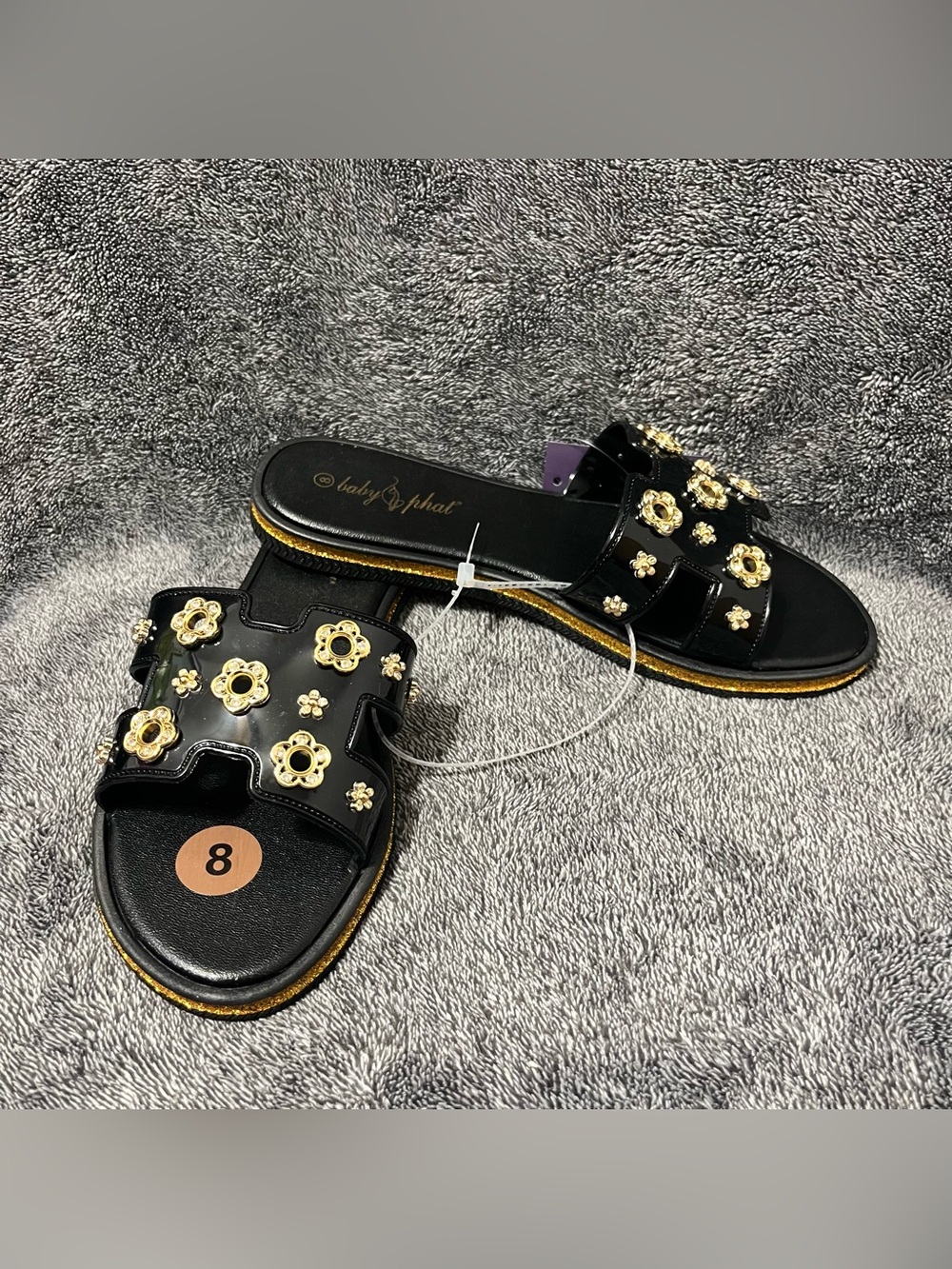 Baby Phat black sandals with gold metallic floral embellishments sizes 8,9